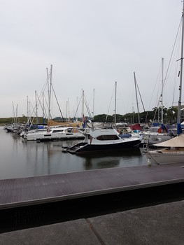 The Absolute Calm / Little yachts and boats resting on calm waters