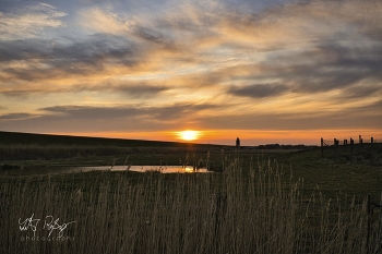 &nbsp; / Sonnenuntergang beim Dagebüller Leuchtturm an der Nordsee