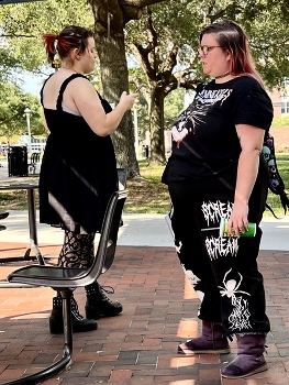 University Students / Female students waiting outside for the start of the class