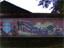 Стационарный путеводитель / Граффити на стене в городском парке.