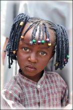 Нгуя / Фотография была сделана в сламсах (трущобах) Найроби. Девочку зовут Нгуя - ей 5 лет