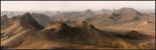 Assekrem (2)... / Панорама 9 кадров, утро.

++++++

На языке туарегов Ассекрем означает -Конец Мира.
И в это легко вериться, достаточно доехать сюда и взобраться на один из вулканических останецев.
С точки зрения геологии- Ассекрем- останки базальтового жерла вулкана( трубы), с возрастом в несколько миллионов лет.