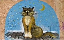 Кот на крыше / Есть замечательное место, где живёт много котиков и есть художник который нарисовал это на стене.