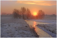 A winter sunrise in Belgium. / A sunrise in my region in the winter