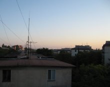Над крышами / Вечер,красивое крымское небо,крыши домов