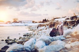 Nordic Princess / Girl sitting on the river-bank
