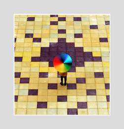&nbsp; / Девушка с радужным зонтиком на детской площадке