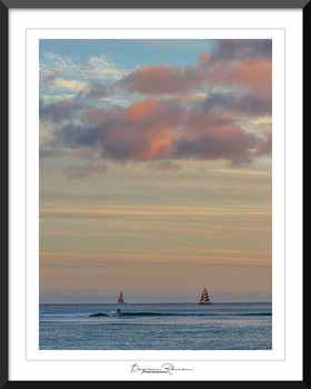 &nbsp; / Last ride of the day for a surfer near Honolulu