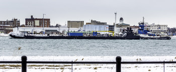 &nbsp; / this barge was heading downriver under the power of a tug