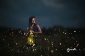 &nbsp; / A girl with fireflies.