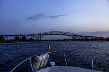 &nbsp; / The bridges at dusk from a boat on the river