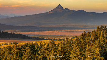 &nbsp; / Sunset over the valley reaching out to Mt. Thielson. Taken from the crater edge of Mt. Mazama, Crater Lake National Park